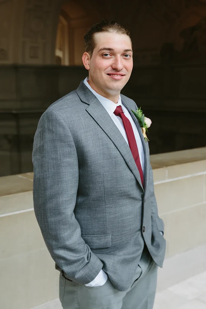 Groom smiles