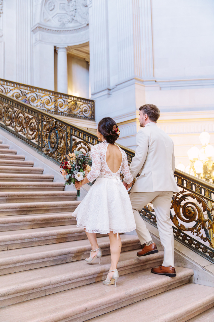 Couple walk together upstairs