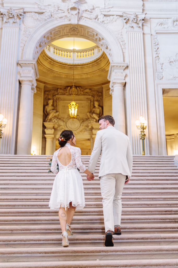 Couple walk together upstairs