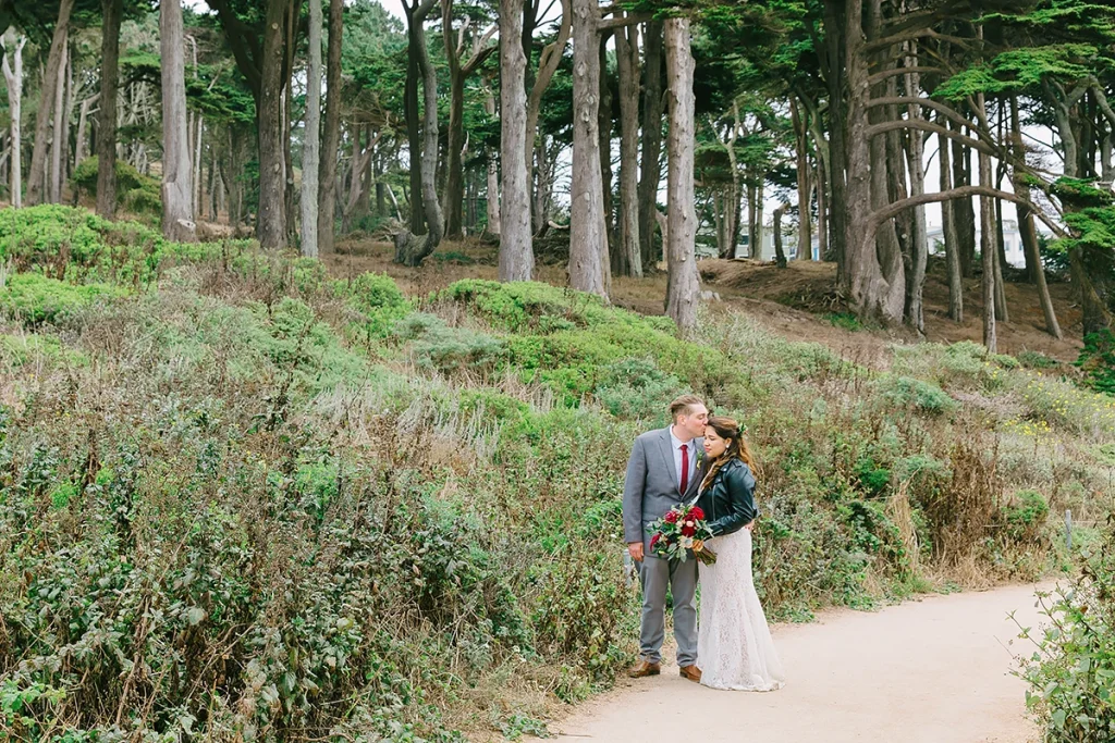 Couple walk together at Lands End SF