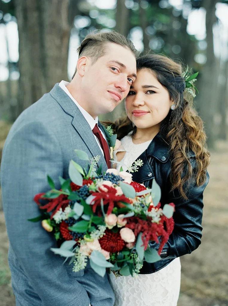 Bride and groom hold each other closely