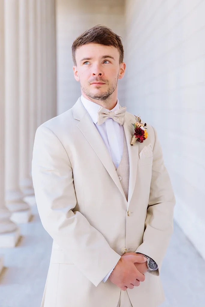 Portrait of groom looking serious
