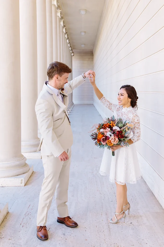 Bride and groom dance together