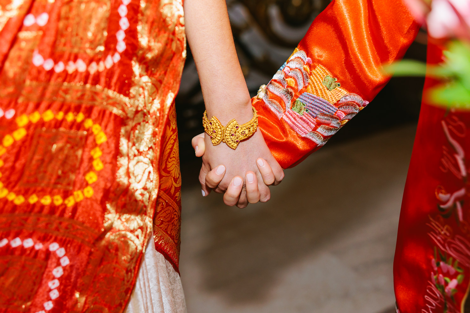 Closed up of two marriers holding hands