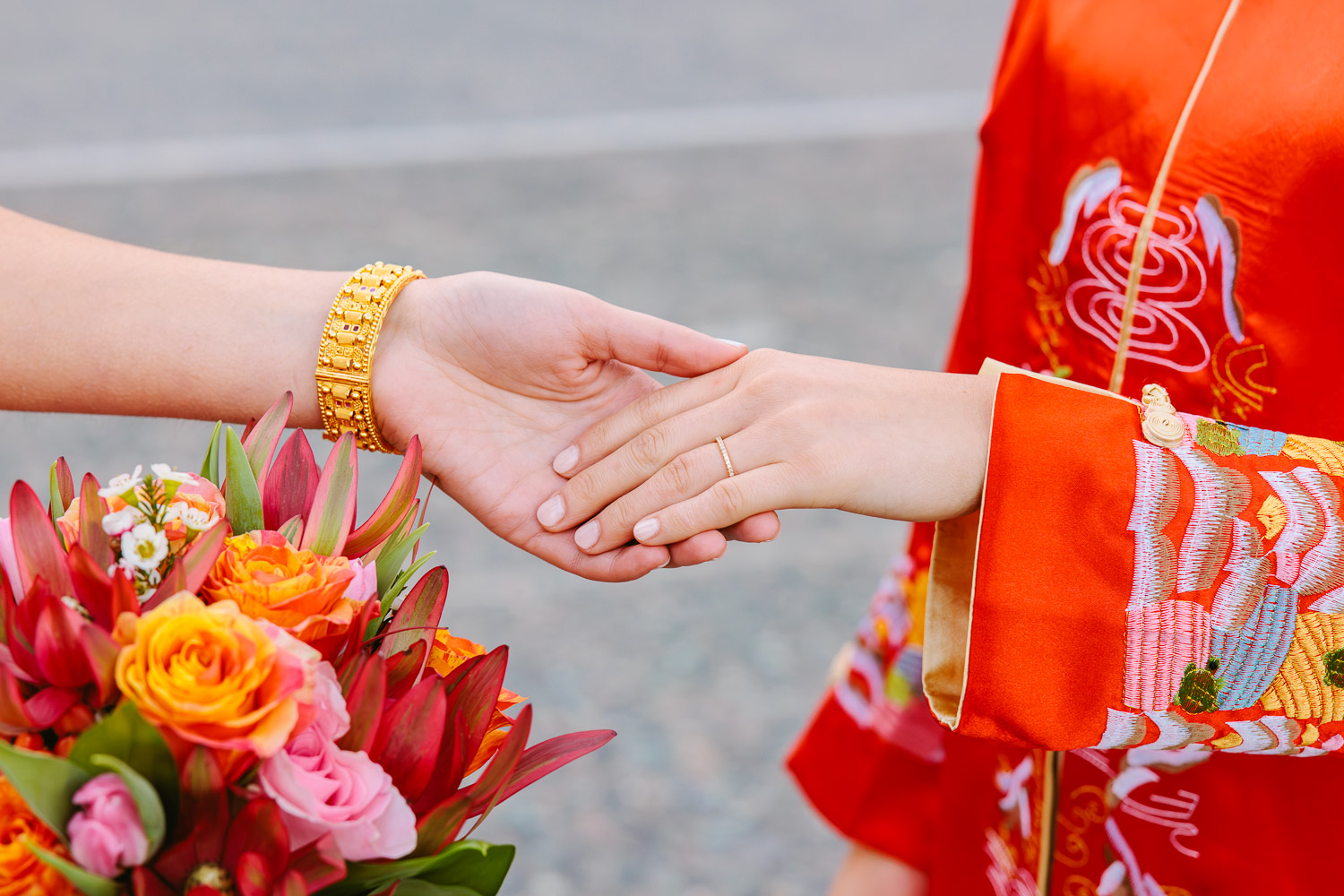 Couple hold hands
