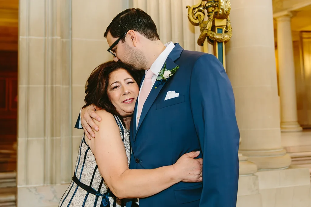 Groom hugs his mom