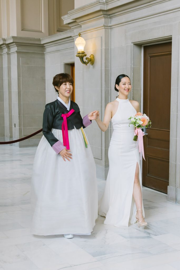 Bride enters ceremony with her mother