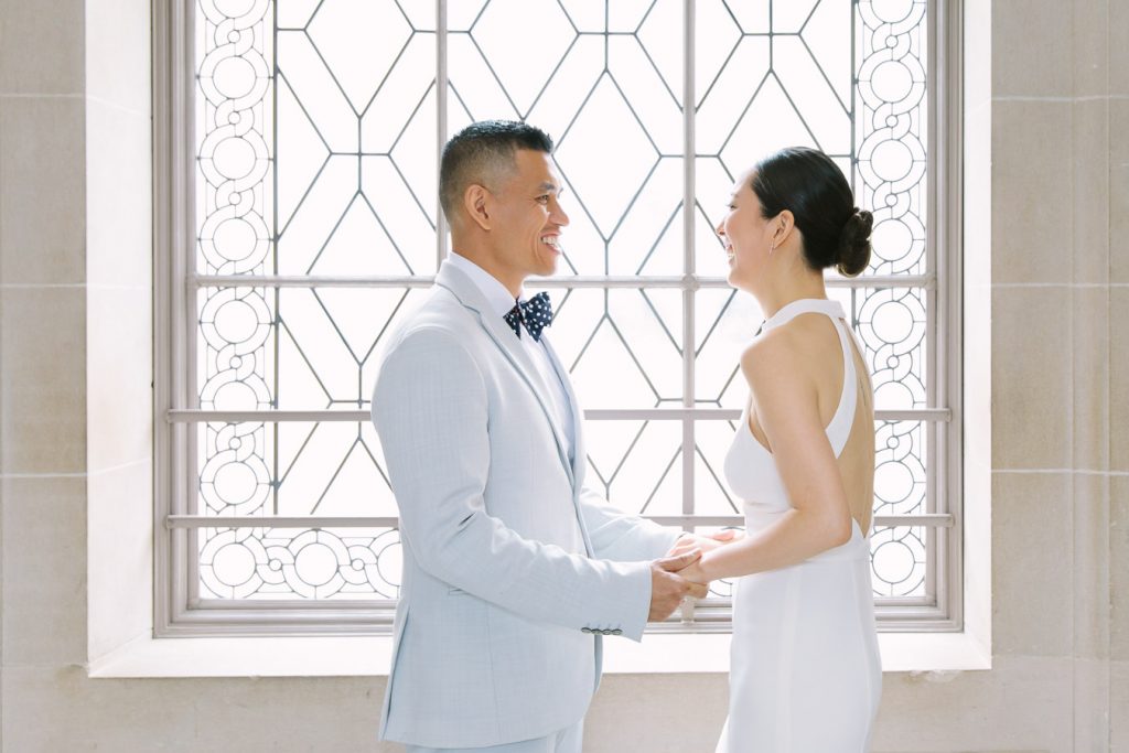 Bride and groom holding hands during their First Look