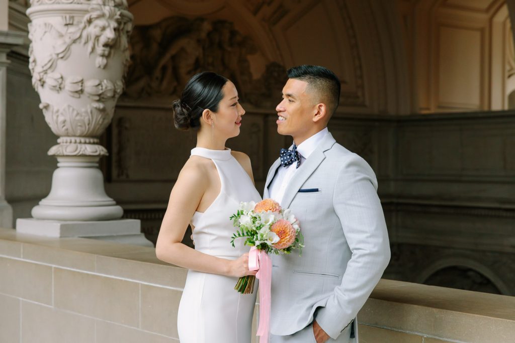 Bride and groom hugging each other