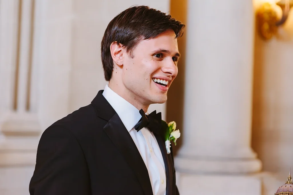 Groom laughing