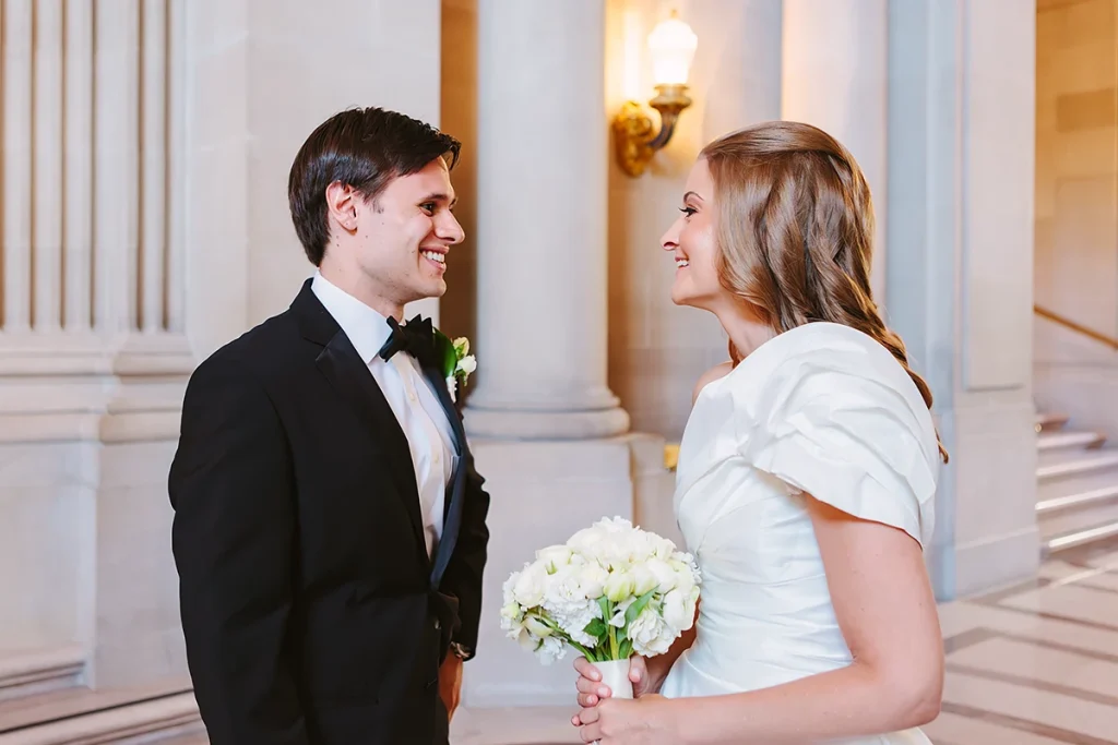 Bride and groom chat before wedding ceremony
