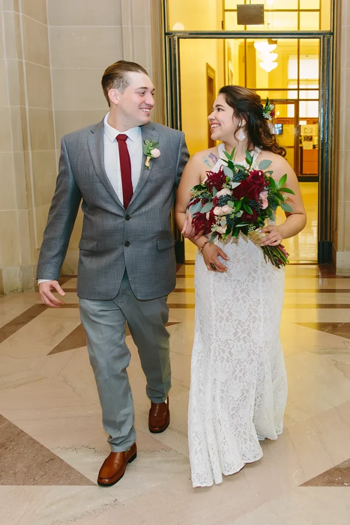 Bride and groom walk to their civil ceremony