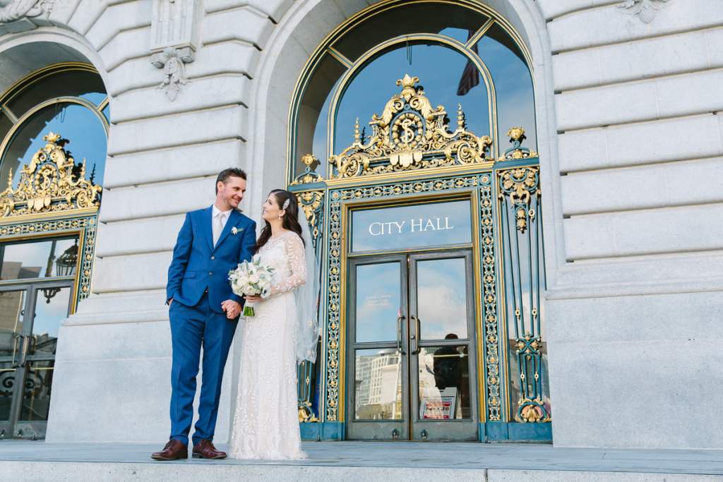 Bride and groom at their San Francisco City Hall wedding. How to get married at San Francisco City Hall