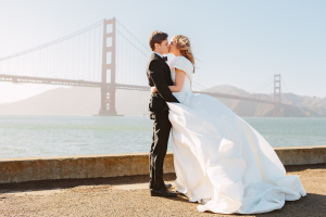 Couple kiss at their Crissy Field wedding photos