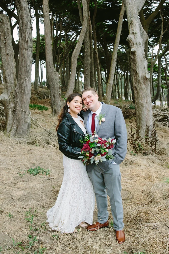 Bride and groom with trees in background
