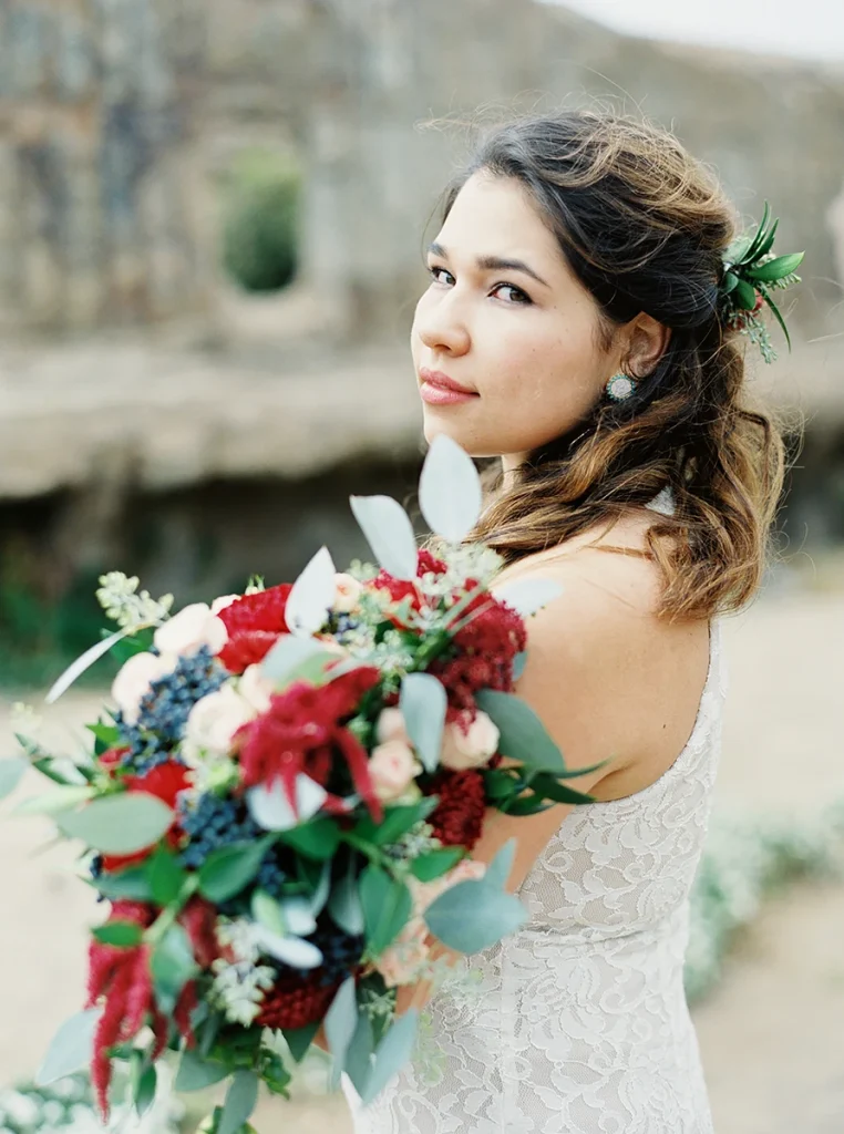 Bride with jewel tone bridal bouquet