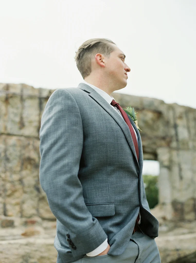 Portrait of groom looking off into the distance